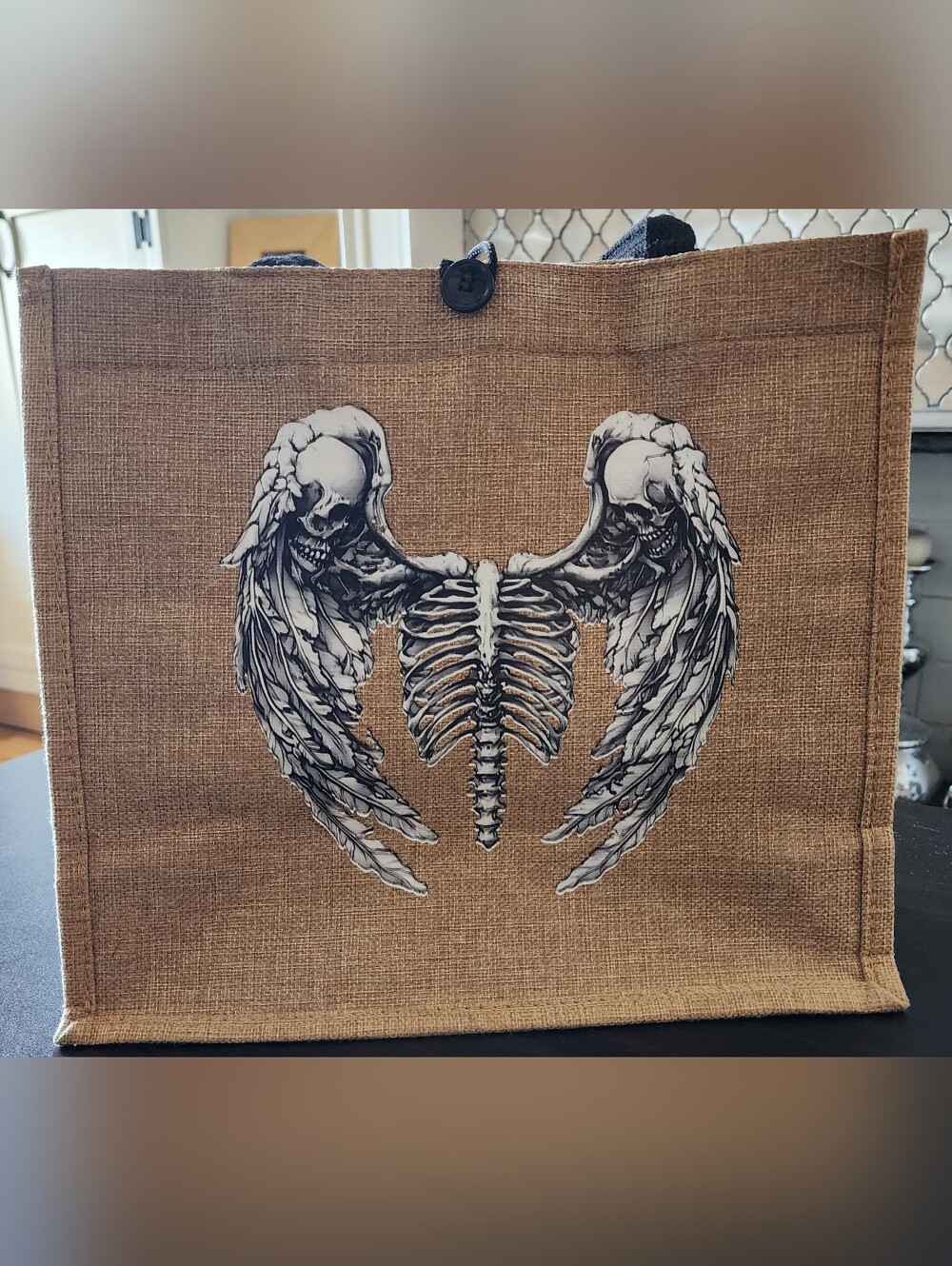 Tote Bag with Winged Skull Graphic